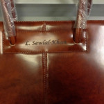 Name engraved on bag